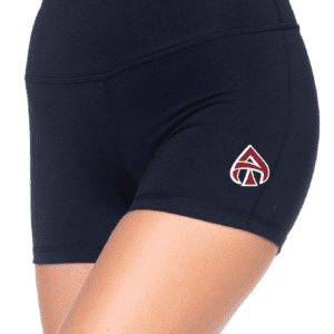 A woman in ACES Shorts with a red and white logo.